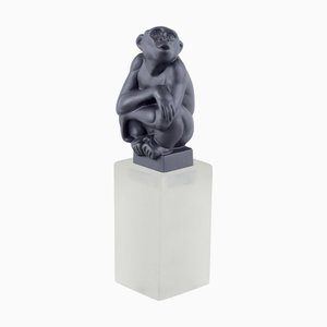Chimpanzee Figure in Bisquit on a Glass Base
