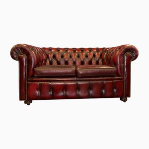 Divano Chesterfield vintage a due posti in pelle