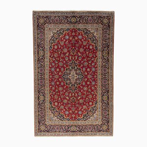 Alfombra Mashhad tejida a mano con medallón y decoración floral