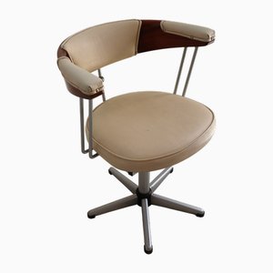 Silla giratoria de acero y cuero, años 80