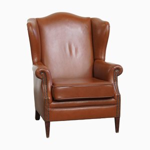 Poltrona in pelle bovina color cognac, Regno Unito