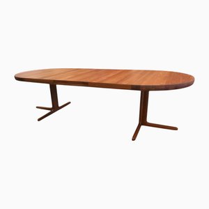 Danish Round Dining Table in Teak on Column Base with Three Extension Leaves, 1960s