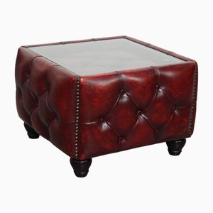 Mesa de centro Chesterfield de cuero de vaca en color rojo con tablero de vidrio