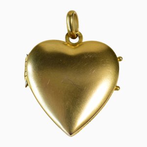 Medallón con colgante de corazón bañado en oro de Maison Savard, 1910