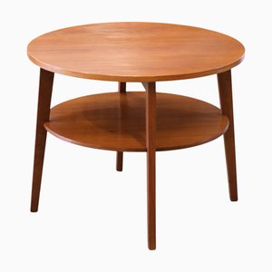 Tavolino da caffè rotondo in teak con portariviste, Danimarca, anni '60