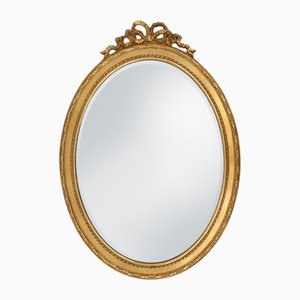 Oval Shaped Carved Gilded Baroque Mirror with Beveled Glass, 1960s