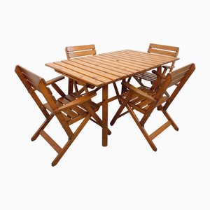 Mesa de jardín extensible vintage de madera con butacas, años 60. Juego de 5