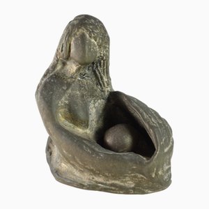 Escultura de mujer de bronce, años 70