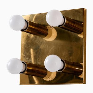 Lámpara de pared de latón dorado