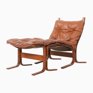 Sedia Siesta vintage in pelle color cognac con poggiapiedi di Ingmar Relling per Westnofa, anni '60