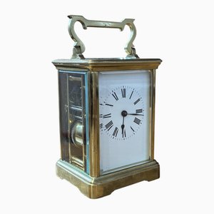 Reloj con carro grande de latón en vidrio de borde biselado grueso