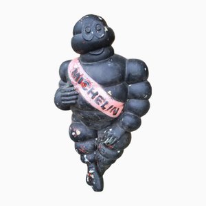 Statuetta Michelin vintage in metallo