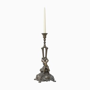 Antique Candleholder in Cast Spelter with Putto, Late 19th Century