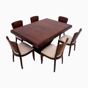 Ausziehbarer Vintage Tisch aus Nussholz mit Stühlen von Louis Majorelle, 1920er, 7er Set