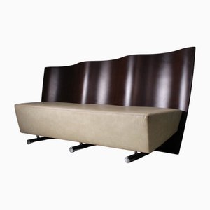 Divano post-moderno in legno e pelle
