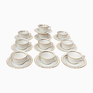 Tazas y platillos franceses de té o café de porcelana. Juego de 20