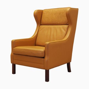 Orangefarbener dänischer Sessel, 1970er