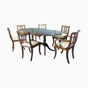 Mesa de comedor extensible y sillas vintage, 1960. Juego de 7