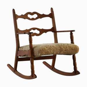 Mecedora de roble de Henning Kjærnulf, años 60