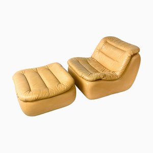 Set aus Vintage Ledersessel und Ottomane