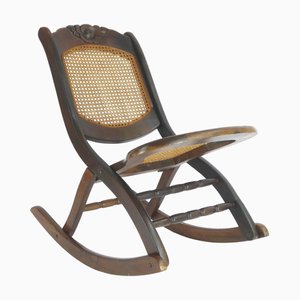 Sedia a dondolo vintage in legno di vimini