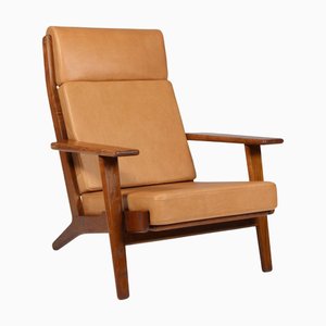 Poltrona modello 290A in quercia fumé attribuita a Hans J. Wegner per Getama, 2023