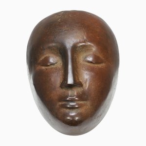 Cabeza abstraída, años 60, bronce