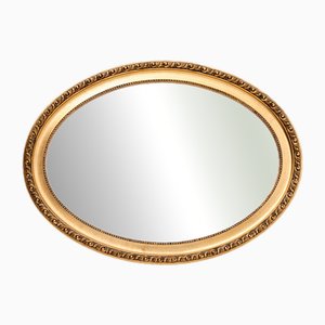 First Half of the 20th Century Oval Mirror in Gold Frame, France