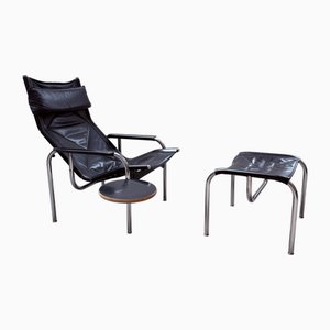 Set aus Leder & Stahl Tube Sessel & Ottomane von Hans Eichenberger für Strässle, Schweiz, 1970er