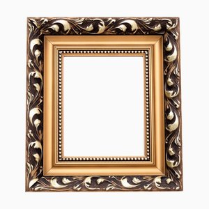 Specchio vintage con cornice dorata