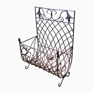 Cesta de troncos de hierro forjado, años 60
