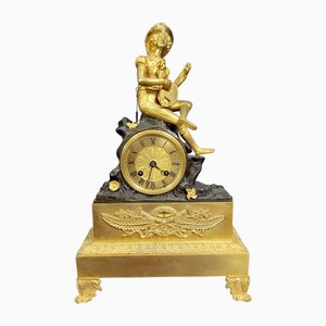 Orologio Impero Troubadour in bronzo patinato e dorato, metà XIX secolo