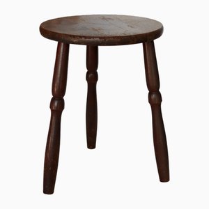 Antiker Dreibeinhocker aus gedrechseltem Holz