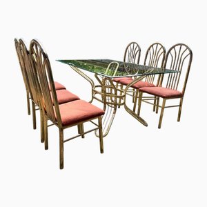 Mesa de comedor y sillas italianas de latón, años 70. Juego de 7