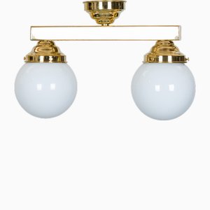 Lámpara de pared funcionalista con esfera de vidrio opalino, años 30