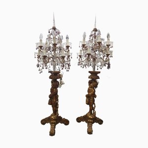Candelabri elettrificati in legno dorato con putti, fine XIX secolo, set di 2