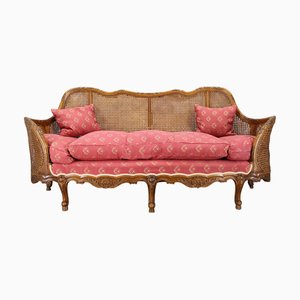Antique Carved Sofa with Cane Sides, 1900