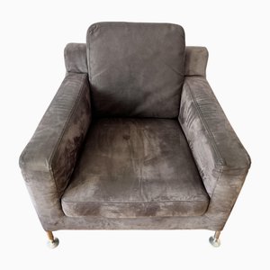 Butaca minimalista en gris de Antonio Citterio para B&B Italia, 1995