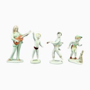 20th Century Porcelain Sculptures of 4 Children from Hollohàza Manufactory, Aquincum, Hungary, Mid-1950s, Set of 4