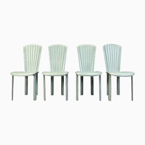 Sillas de comedor posmodernas de cuero verde, años 80. Juego de 4