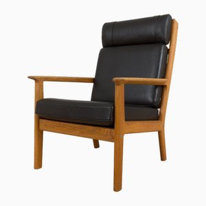 Eiche & Schwarzer Leder Armlehnstuhl GE 265 von Hans J. Wegner für Getama, Dänemark, 1970er