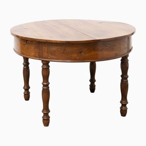 Round Table in Walnut Wood