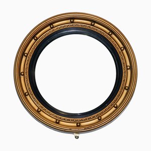 Espejo de pared Butlers antiguo convexo de madera dorada en negro y dorado, años 20