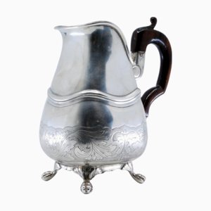 Silver Teapot with Engraved Floral Motifs