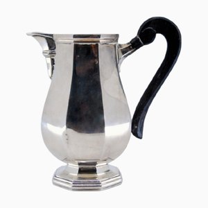 Schlichter, achteckiger Weinkrug aus Silber mit Griff aus Kastanienholz