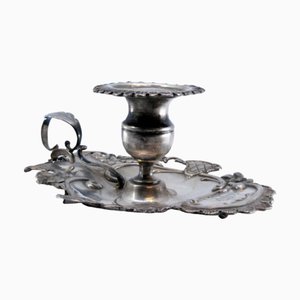 Silbernes Paddel mit Muscheln und Blumenmotiven