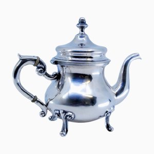 Silberne Kaffeekanne mit Füßen und Knopfdeckel
