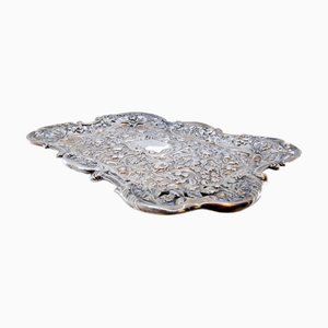 Ticketschalter mit Muscheln und Blumenmotiven