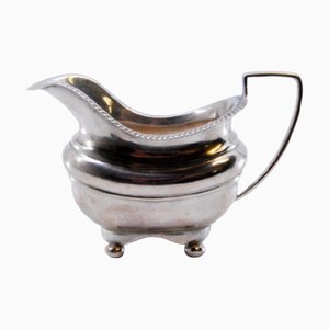 Silver Creamer with Grooved Edge and Round Feet