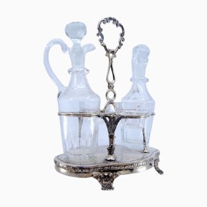 Silver and Cut Glass Cruets with Embossed Applications and Claw-Shaped Feet, Set of 5